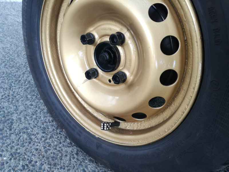 dicey. I did the best I could when prepping the rusty wheels. I had a few friends over to help. We couldn’t be bothered to clean up ALL the rust bubbles from the outer rings, it was too much work.